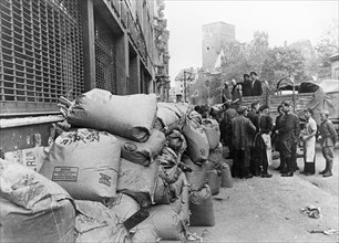 Soviet food relief, bags of flour and suger ready for distribution to stores in berlin,  1945 or 1946.