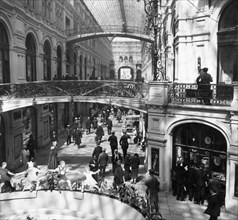 Famous arcade passage way of gum, state department store on red square, moscow, ussr, 1935, a photograph by visiting american photographer and journalist julien bryan.