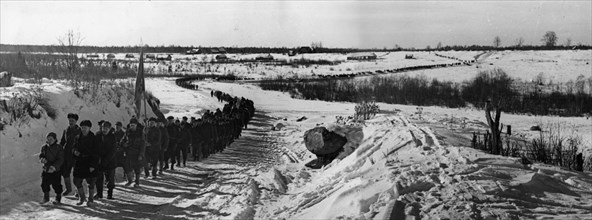World war 2, leningrad region, partisans marching towards leningrad to meet up with red army troops, march 1944.