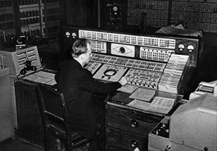 A technician at the control board of the strela-1, a general purpose computer at the calculating center of moscow's ussr academy of sciences, 1950s.