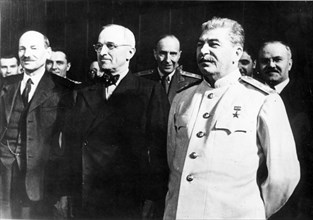 Stalin, truman, attlee (left), and molotov (right) at the berlin conference of the heads of the governments of ussr, gb and u,s,a, in 1945.