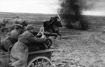 A machine-gun carriage supporting a red army cavalry charge, may 1944.