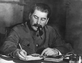 Joseph stalin, around 1939, in his office in the kremlin, moscow, ussr.