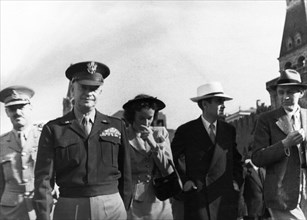 Us army general dwight d, eisenhower with us ambassador w, averell harriman and miss kathleen harriman after watching a sports parade in red square during his visit to moscow after the war, 1945.