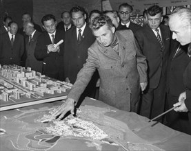 Romanian president nicolaae ceausescu talks with experts and town councillors about the extension of the iron and steel combine and development of hunedoara town, romania, 1970s.
