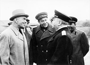 On the 4th of september at the moscow central airport, molotov, vice-chairman of the council of people's commissars for foreign affairs chatting with romanian premier p, groza.