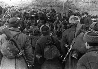 World war 2, battle of stalingrad, major general guriev, commander of the division, addresses the first reinforcements who arrived at stalingrad over the frozen volga river.