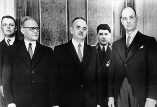Us ambassador george f, kennan (right) standing with nikolai shvernik, president of the presidium of the soviet parliament after presenting his credentials, moscow, may 15, 1952, on the left is a,f, g...