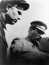 Nikita khrushchev and joseph stalin, may 1, 1932.