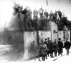 Red army soldiers near an armored train during the kronshtadt revolt in 1921.