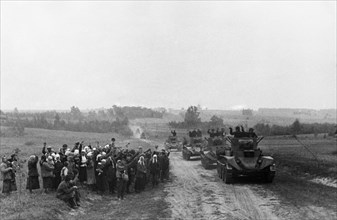 Peasants greeting units of the red army near grodetsk in western belorussia, september 1939, on september 17, 1939 the soviet government gave instructions to the high command of the red army tocross t...