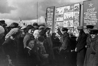 Lieutenant of a soviet tank unit lectures vilno inhabitants about the lives of workers in the ussr, october 1939, vilno, capital of lithuania,  was annexed by poland between 1920-1939, occupied by sov...