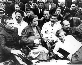 Stalin and kirov (same row, far left) in 1930.