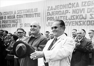 President tito and gheorghe gheorghiu dej acknowledging citizens' cheers at the mass meeting at kladovo marking the beginning of the works on the iron gates hydro-electric power plant, sep, 7, 1964.