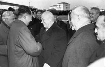 The delegation from the chinese people's republic, headed by mao zedong, arriving at vnukovo airport in moscow and being greeted by nikita khrushchev, november 2, 1957, they have come to participate i...