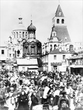 Flea market at the nikitskiye gates, moscow, at the end of 19th century.