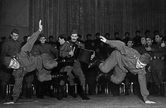 Soviet army dance ensemble performing 'during a halt' in moscow, ussr in the 1950s.