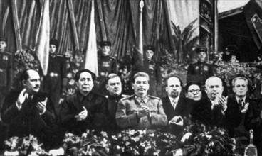 Communist leaders from two continents at the bolshoi theater in moscow at a meeting in honor of josef stalin's 70th birthday on december 21, 1949, (left to right: politburo member l,m, kaganovich; cha...