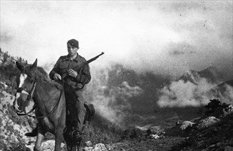 World war 2, a yugoslavian partisan scout in the mountains of yugoslavia.