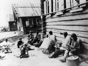 Spoonmakers working in the village of dyakovo in the nizhny novgorod region of russia, 1897.