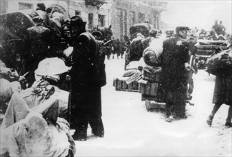 World war 2, jewish citizens of lodz prepare for the forced re-settlement to the city's ghetto, march 1940.