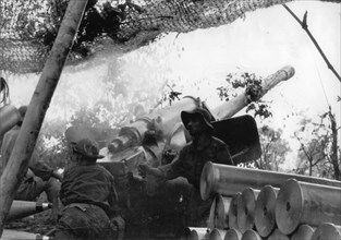 Communist forces attack dau mau base on highway 9, quang tri province, south vietnam, vietnam war, viet cong artillery unit, 130 mm gun, (soviet-made ks-30?).