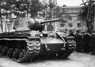 Kv-1 (klement voroshilov) tank, a group of civilians and red army men watch a new kv-1 tank that has just left the factory and will soon be on its way to the front, ussr, world war 2.