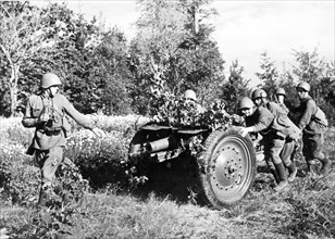 Red army gun crew going to a new firing position during world war ll.