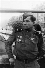 Hero of the soviet union, sargeant major mikhail korotov, atank driver and mechanic who was one of the first red army men to enter berlin, may 1945, before the war he was a tractor driver.