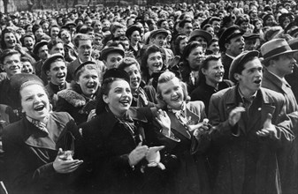 Victory day celebration in leningrad, ussr, may 1945, happy leningrad residents cheering the end of world war 2 in europe.