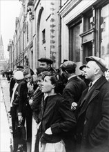 Moscow residents listening to a radio report by molotov announcing the invasion of the soviet union by germany, june 22, 1941.