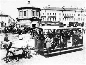 A horse-drawn tram car at the serpukhov gate in moscow, at the end of 19th century.