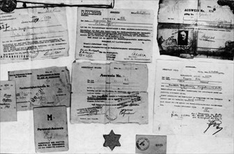 Various documents and identity papers of jewish prisoners at auschwitz.