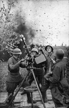 The southern front, soviet anti-aircraft machine-gunners firing at german bombers, june 1942.