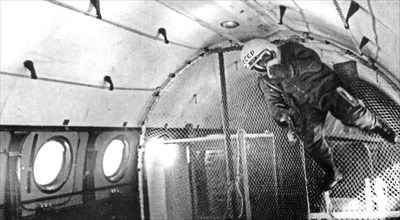 A soviet cosmonaut undergoing training for weightlessness in an airplane, 1960s.