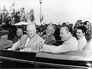 While in moscow, josip broz tito and his wife visited the agricultural exhibit in june 1956, riding on the grounds of the agricultural exhibit, from left to right: v, v, matskevich (near the driver), ...