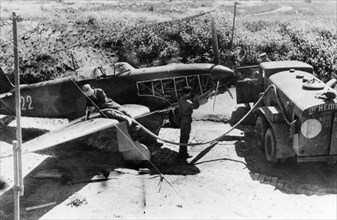 World war 2, soviet air force yakovlev yak-9 fighter being re-fueled in the field.