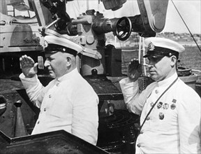 Commander of the pacific fleet of the ussr, vice-admiral yumashev (left) and chief of staff of the pacific fleet, rear-admiral boguenko, on the bridge of the torpedo boat, stalin.