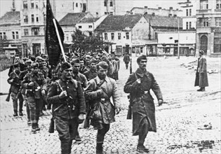 Partisan units of yugoslav national liberation army march into liberated belgrade, october 20th, 1944, yugoslavia, world war 2.