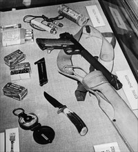 Parts of the emergency military survival kit found in u2 spy plane when pilot francis gary powers was shot down over soviet territory on may 1, 1960, ussr, put on display during his moscow trial, augu...