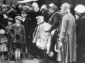 Auschwitz, poland, world war 2, concentration camp victims after disembarking from a freight train at the station near the camp.