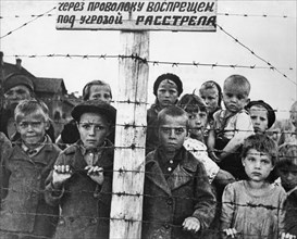 World war 2, children behind barbed wire in a german concetration camp set up in the occupied part of the karelian assr, 1941 or 1942.