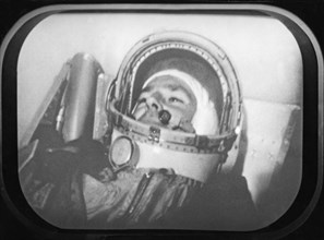 Soviet cosmonaut gherman titov in the space capsule, vostok 2 mission - he was observed the entire flight, 1961, a still from the documentary film 'to the stars again'.