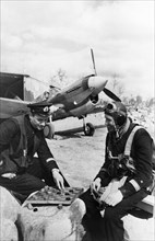 World war 2, two decorated soviet fighter pilots, senior lieutenant v, pokrovsky (left) and captain p, orlov, enjoying a game of checkers between missions, they have each shot down 10 enemy planes, an...