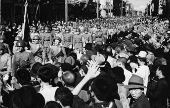 Operation august storm (battle of manchuria), population of harbin, manchuria greet victorious red army soldiers after the japanese surrendered the city on august 20th, 1945, world war 2.