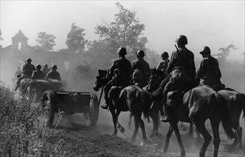 A horse-drawn artillery unit entering a village on the western bank of the don river, august 1942.
