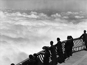 Tourists sightseeing at ching-ting, the peak of omei mountain in the southwest of szechuan province, china, 1950s.