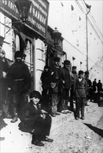 Unemployed day laborers in front of an employment agency in moscow in the 1890s.