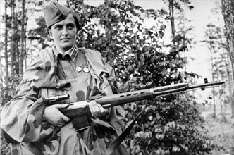 Lyudmila pavlichenko, famous 26 year old russian guerrilla sniper who has killed 309 germans, for which she was made a senior lieutenant and given the order of lenin, a former historian, she participa...
