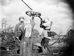 Soviet guerrillas man made an anti-aircraft gun made from an anti-tank rifle mounted on a wheel.